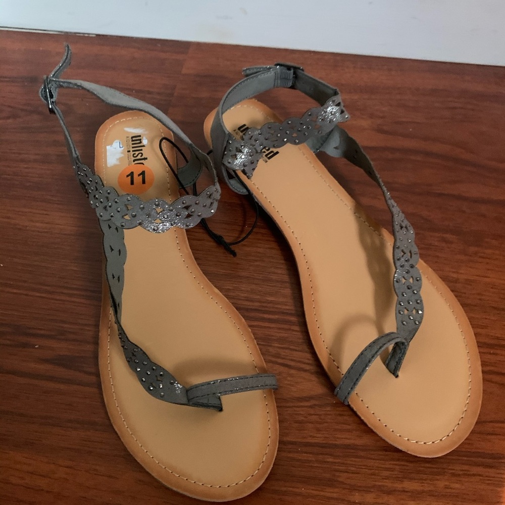 Grey sandals.
